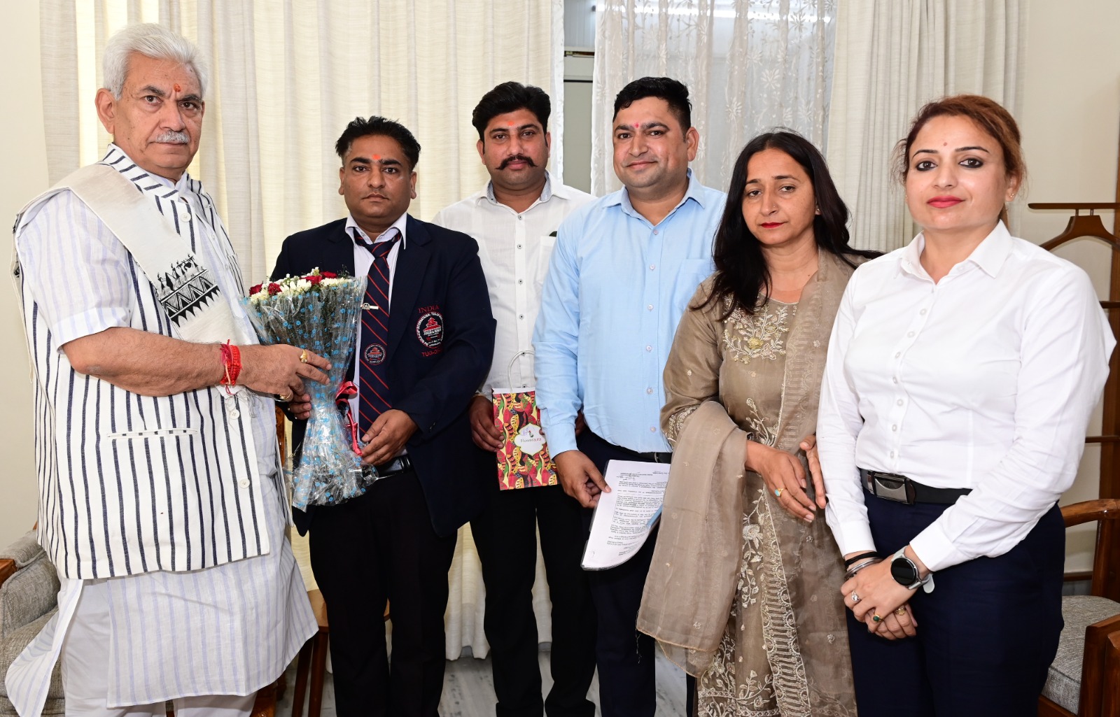 Lt Governor with members of J&K Rehbar-e-Khel Teachers Association